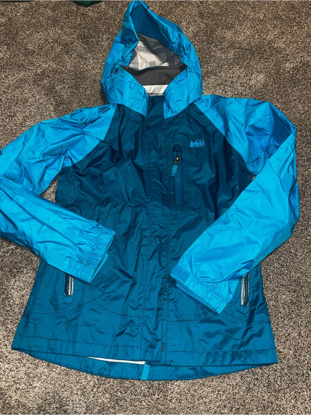 Rei raincoat u used 10/12y nwot